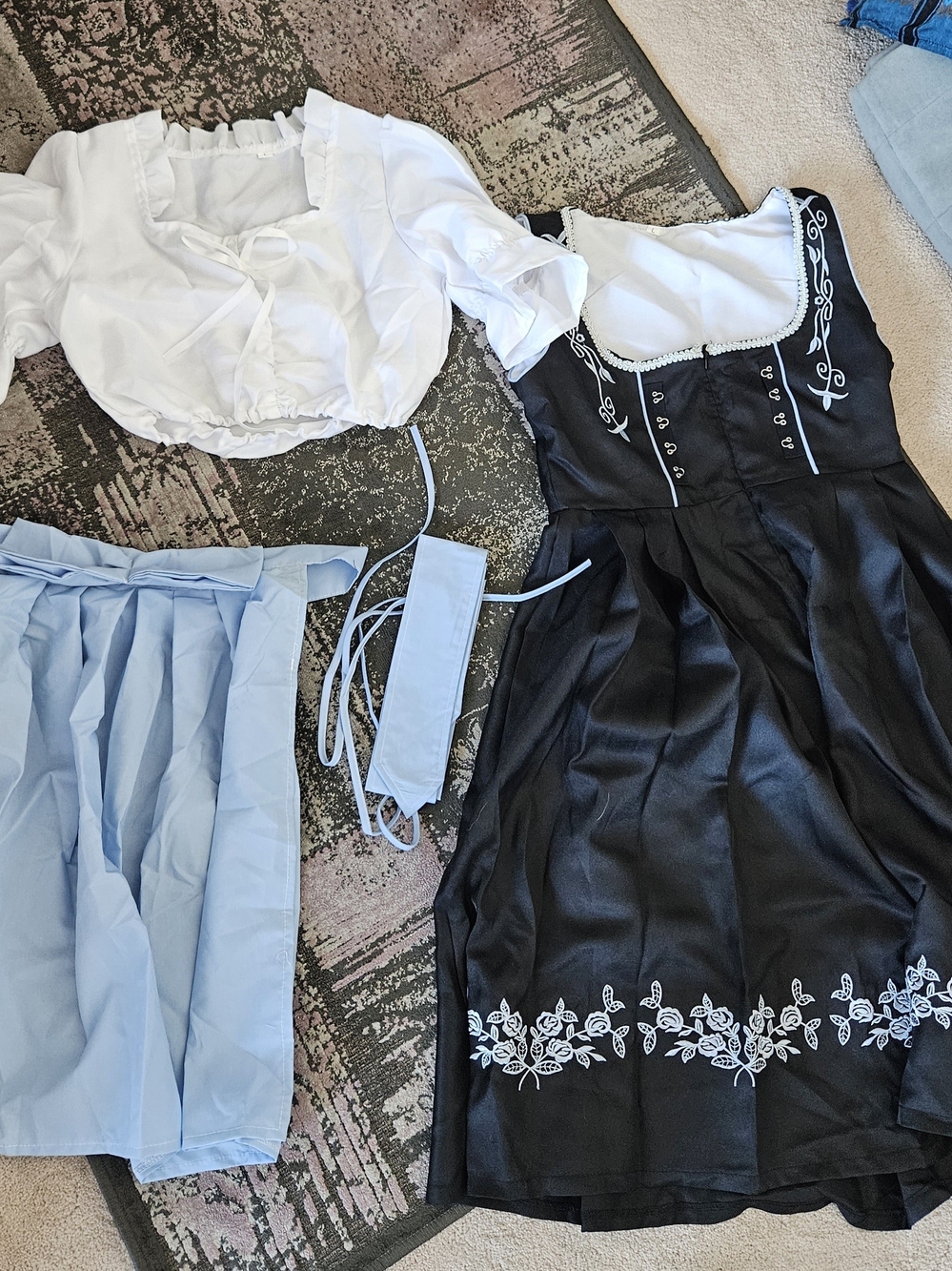 Black Embroidered Dirndl Dress with White Blouse and Light Blue Apron